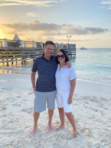 Man and woman on white sandy beach
