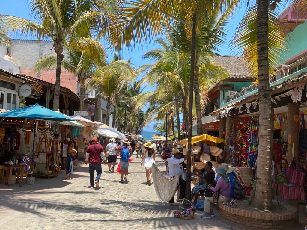 Street with colorful banners overhead