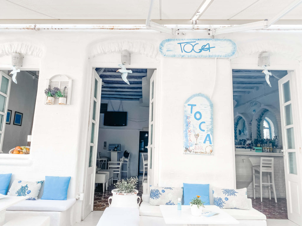 White building with blue shutters