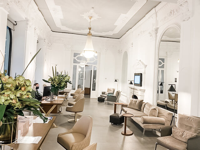 Large hotel room with chandelier