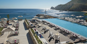 Lounge chairs overlooking blue water