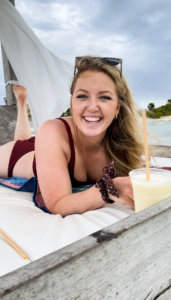 Girl in bathing suit near water