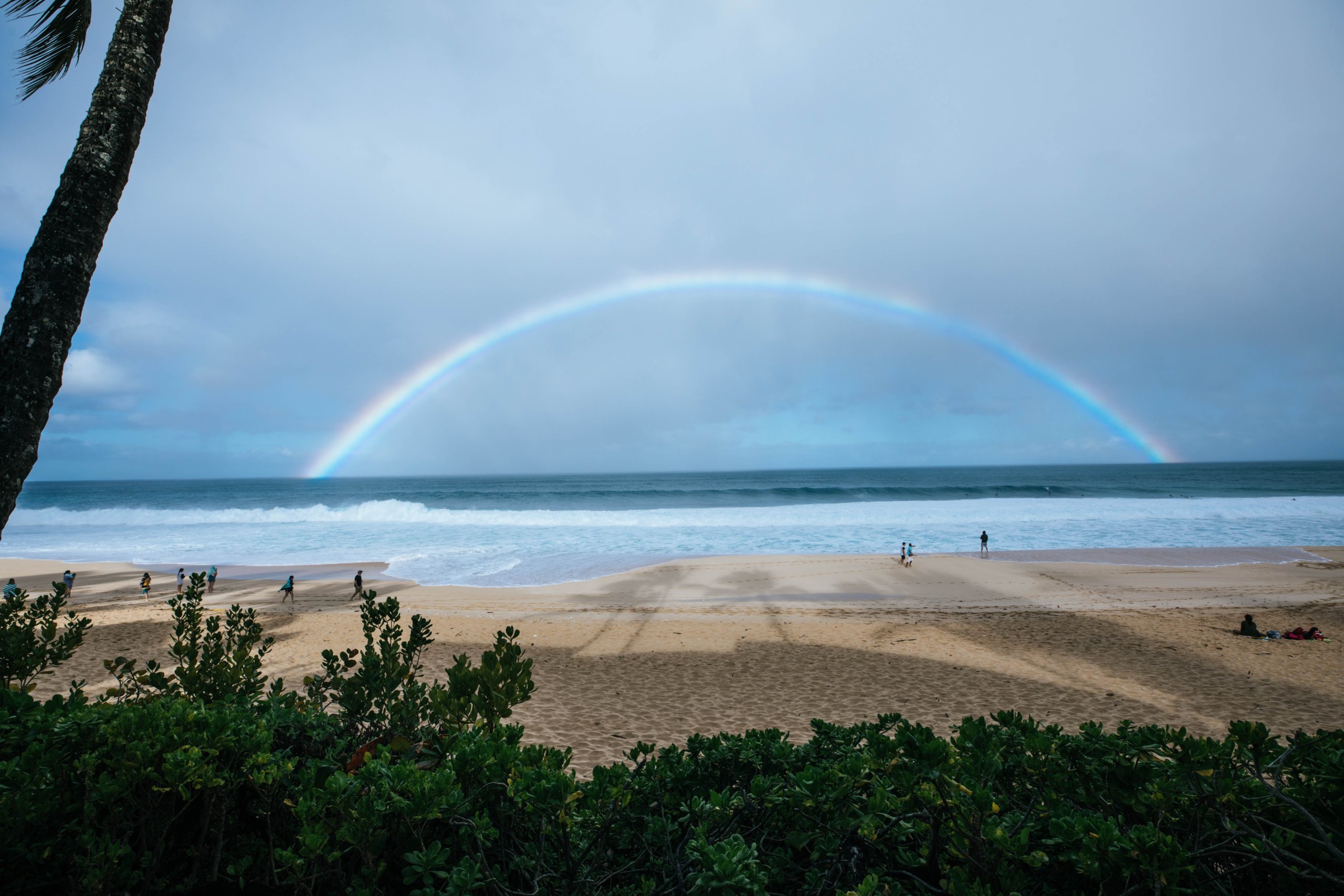 Sand, water and rainbow
