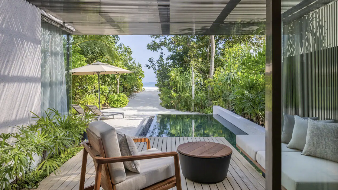 Outdoor view of hotel villa with pool
