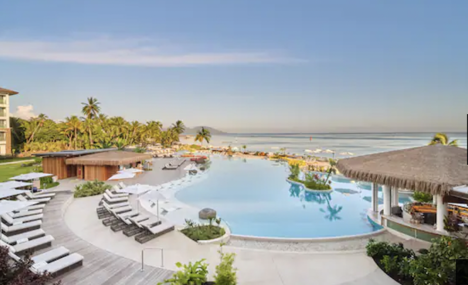 Pool area of resort near ocean