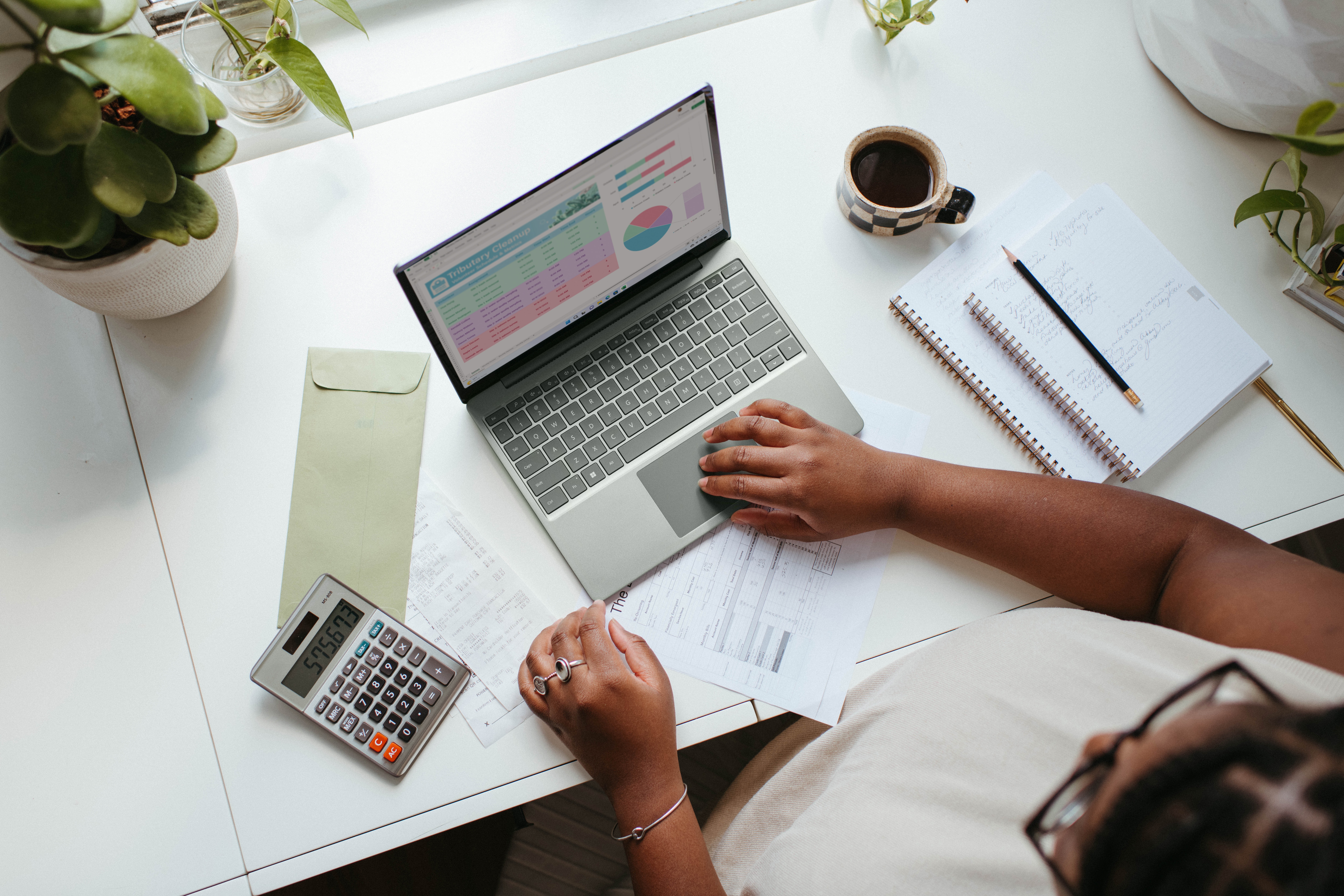 Woman working on computer at desk