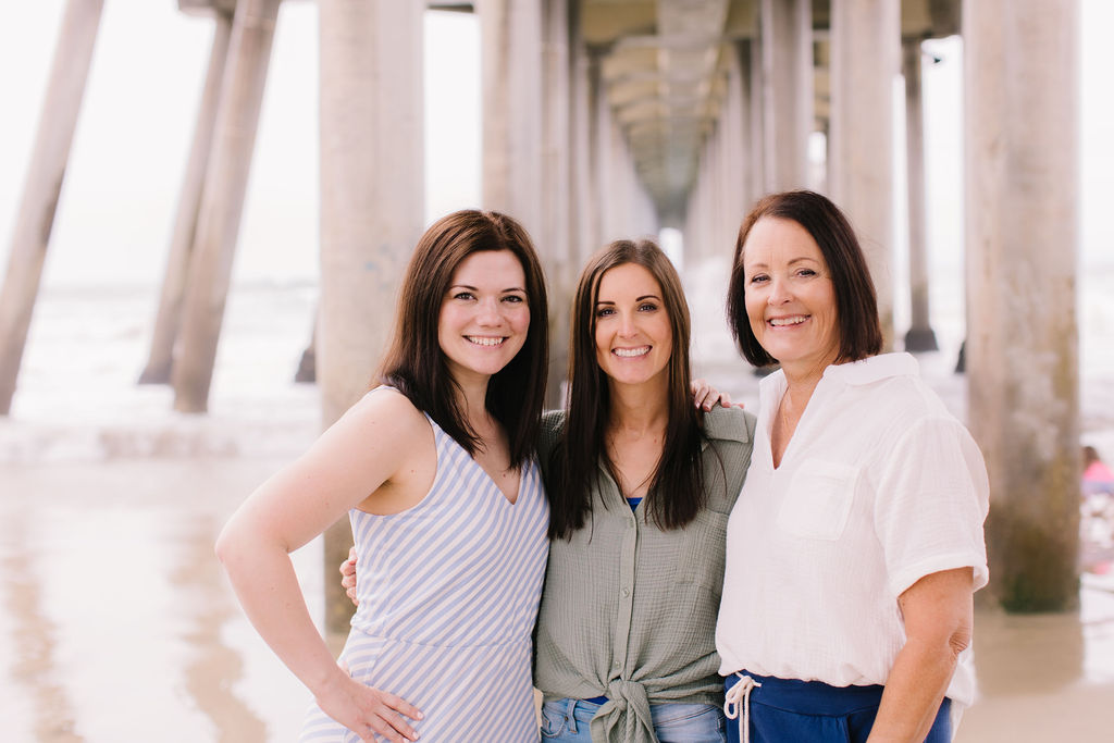 three women under pier