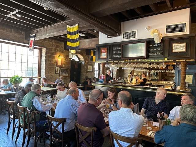 People at table eating food