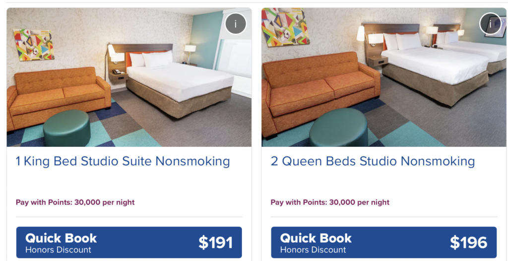 Hotel room with orange couch.