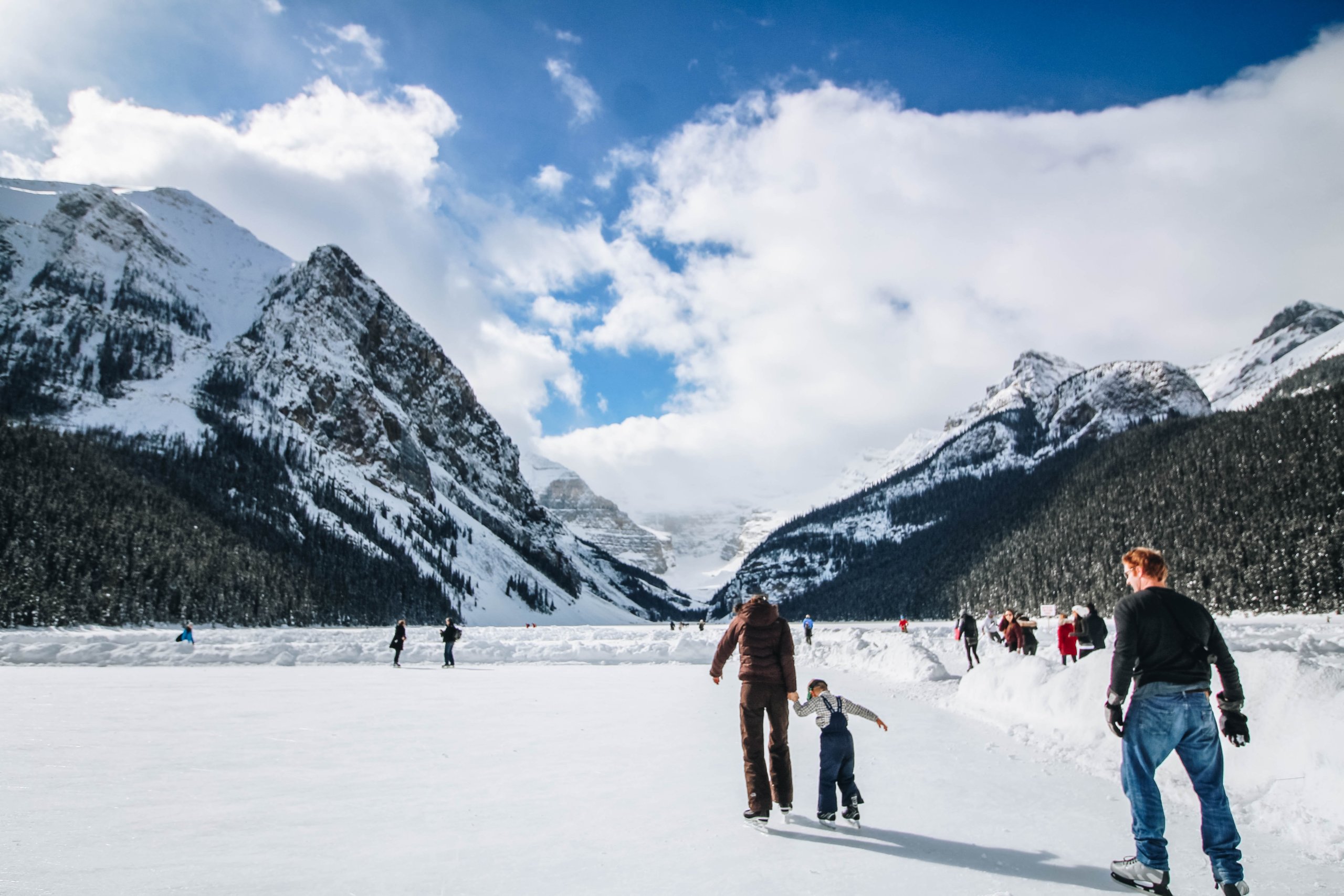 Skiers on snow-covered mountain