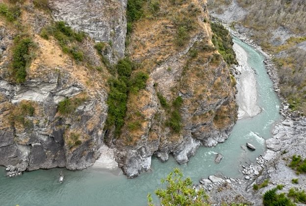 Canyon with blue river running through