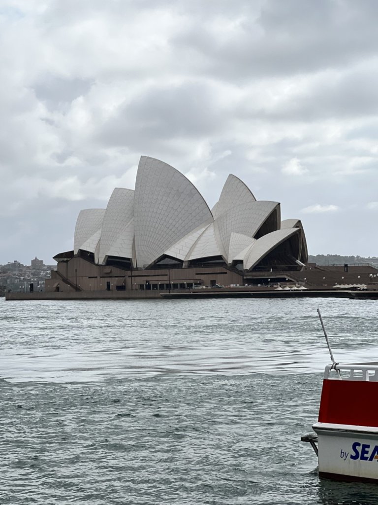 Multi domed white building set near water