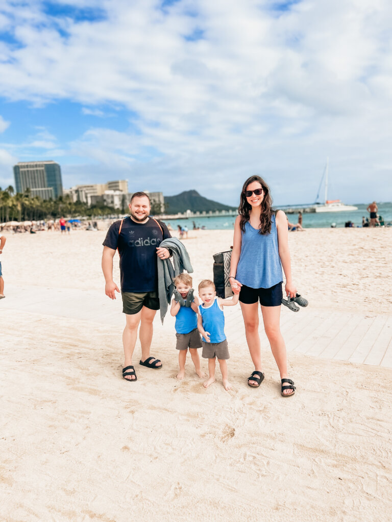 Mom and Dad and twin boys on the beach