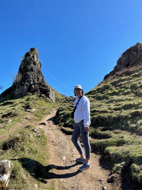 Woman in baseball hat on hiking trail