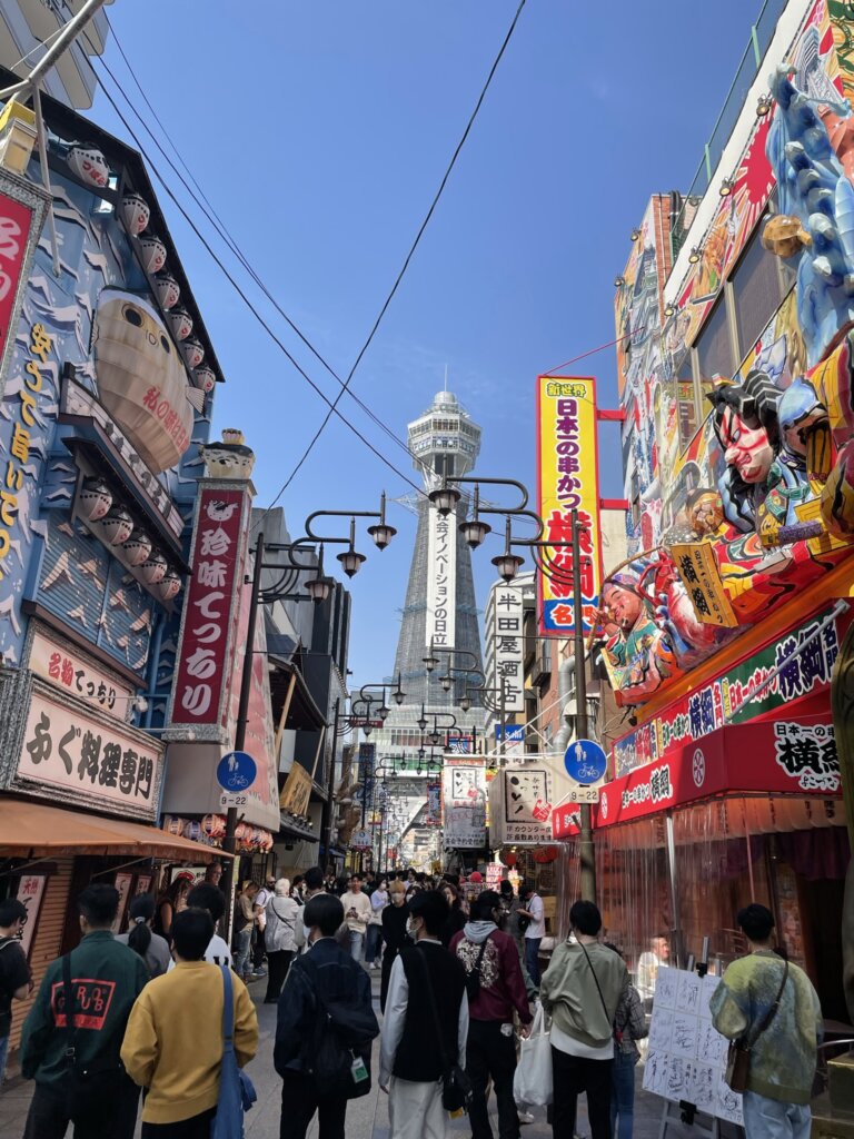 Busy shopping area with Japanese signs