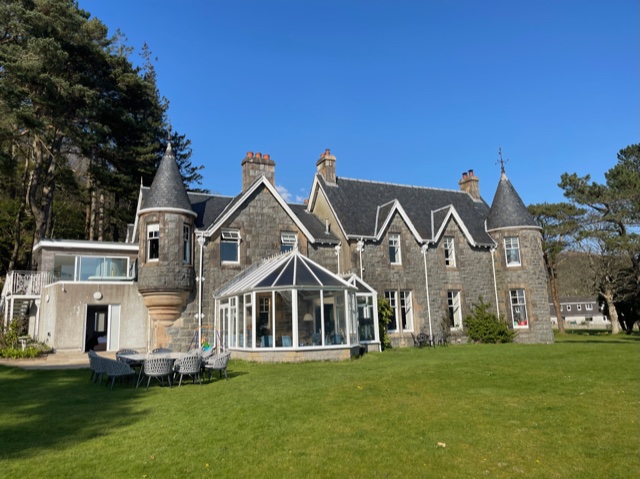 Large grey stone house