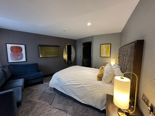 Hotel room with white bed