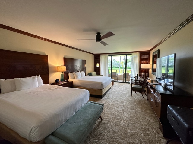 Hotel room with two queen beds of white