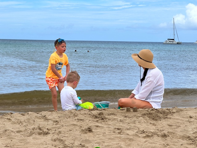 boys with mom on beach