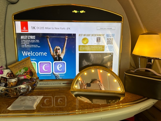 Large tv screen on airplane.