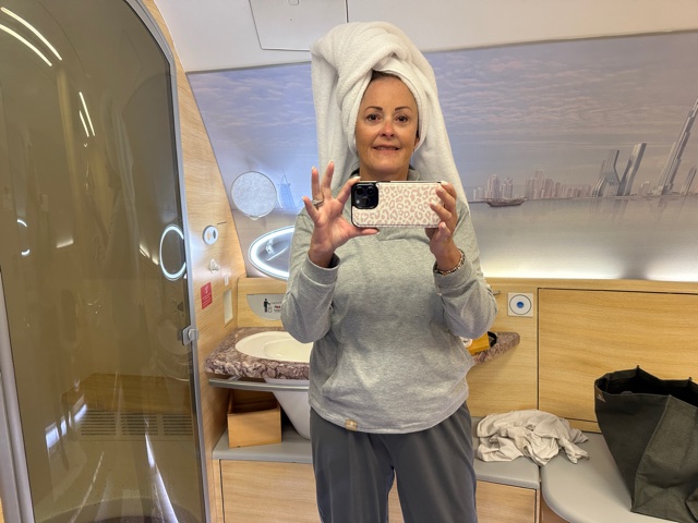 Woman with towel on head.