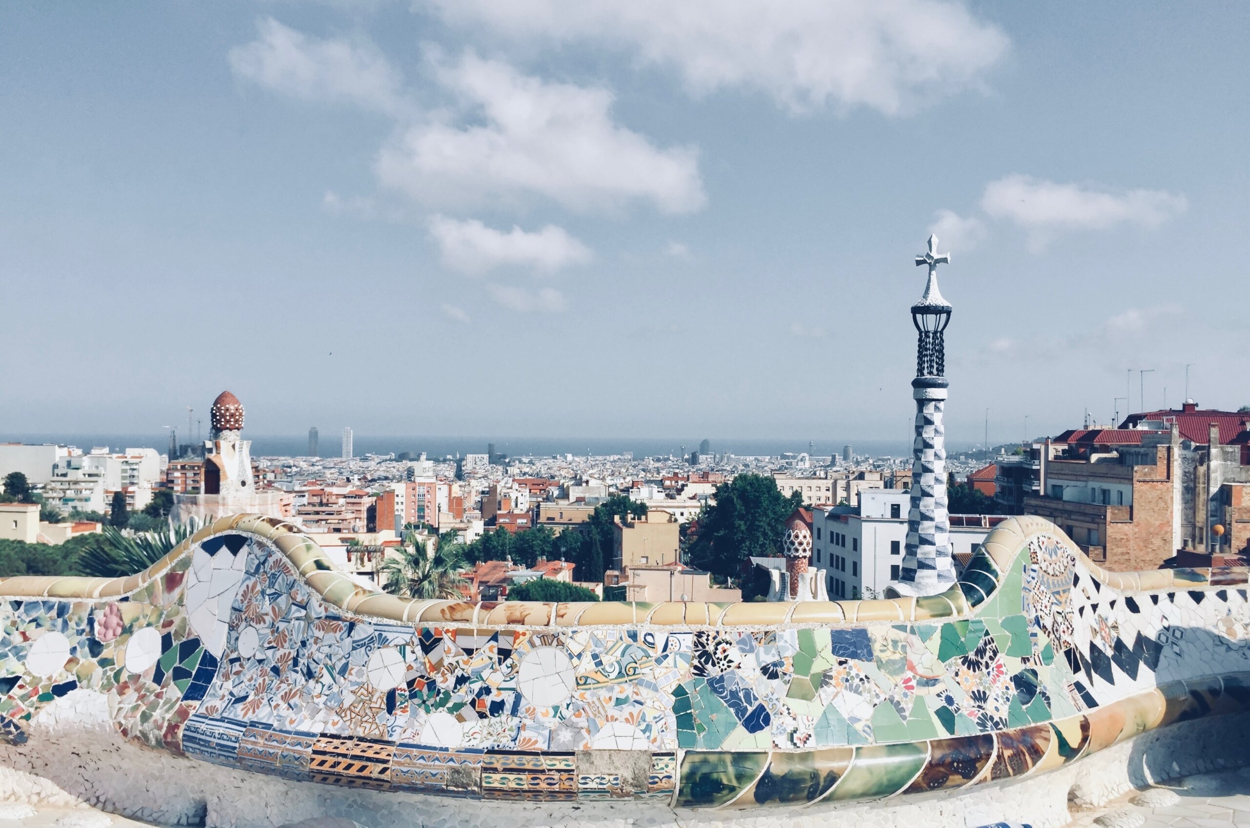 Colorful tiles on wall and view of city.