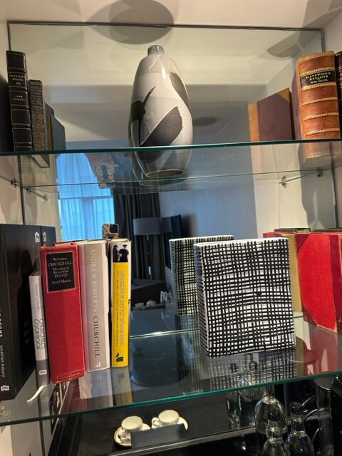 Books on hotel shelf