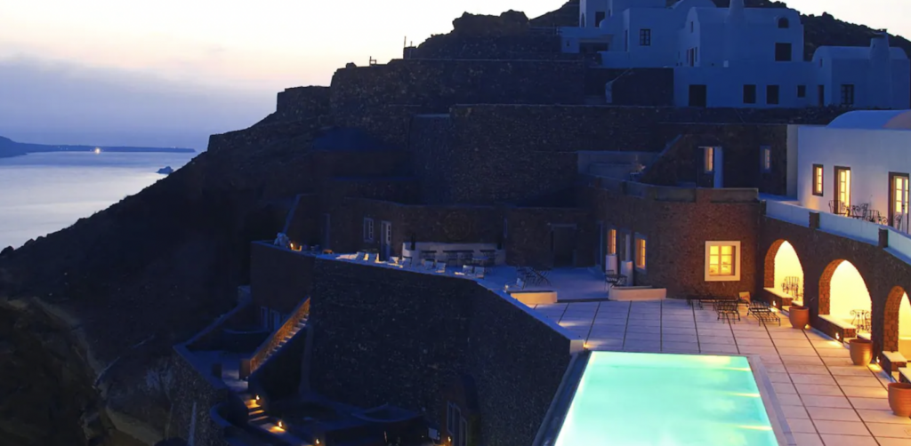 Pool area of hotel with ocean view