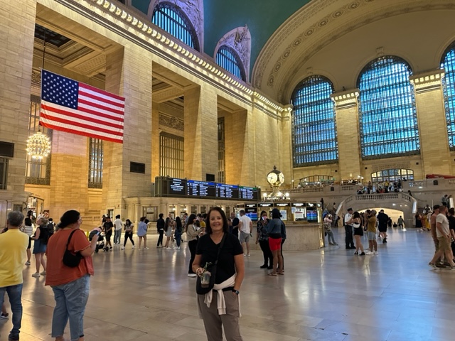 Train station with American flag on the wall