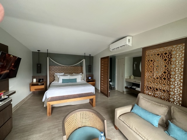 Hotel room in tans and turquoise