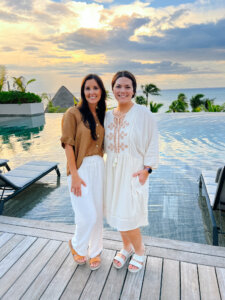 two girls at impressions main pool