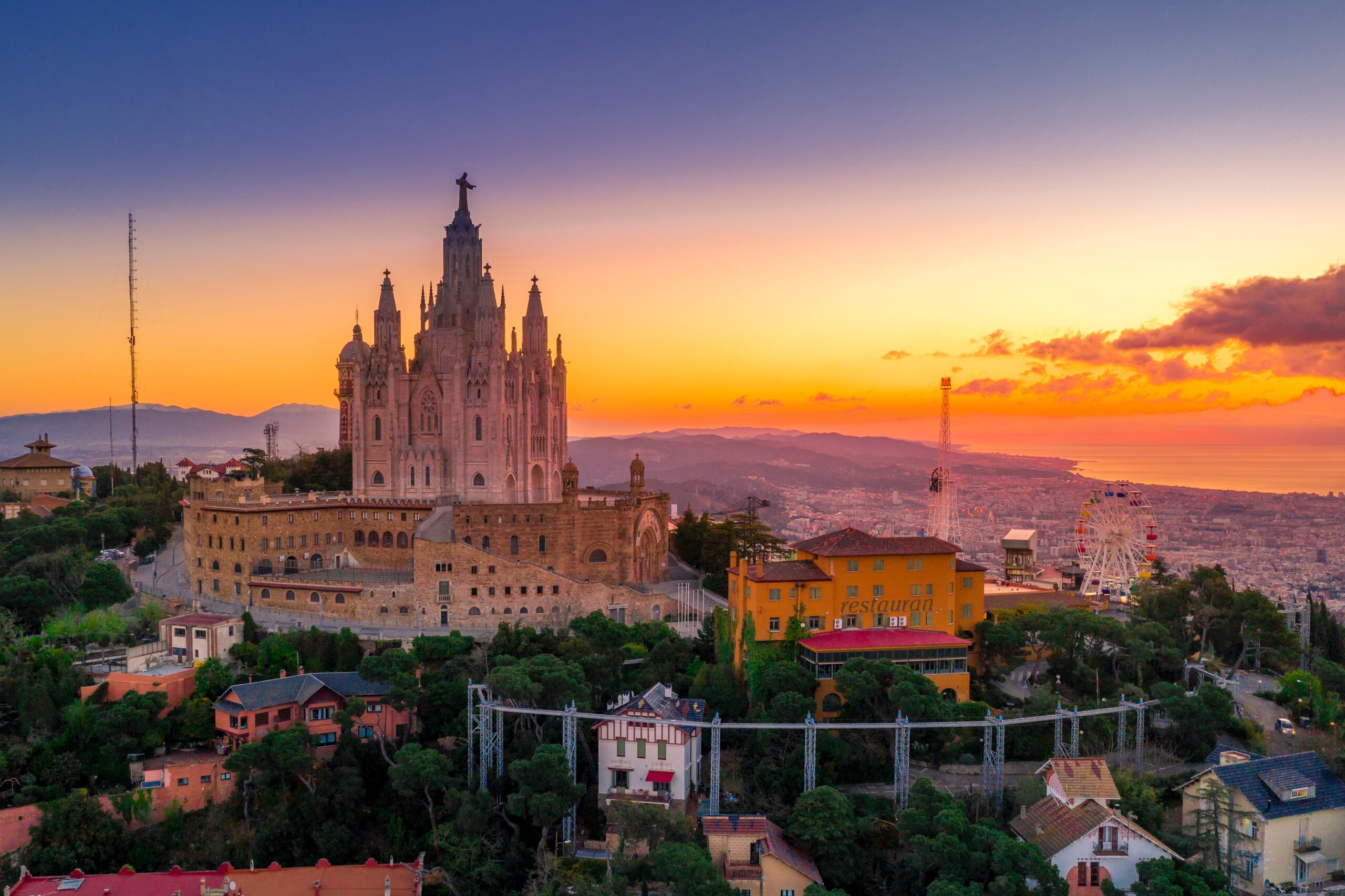 Sunset view of city with large cathedral