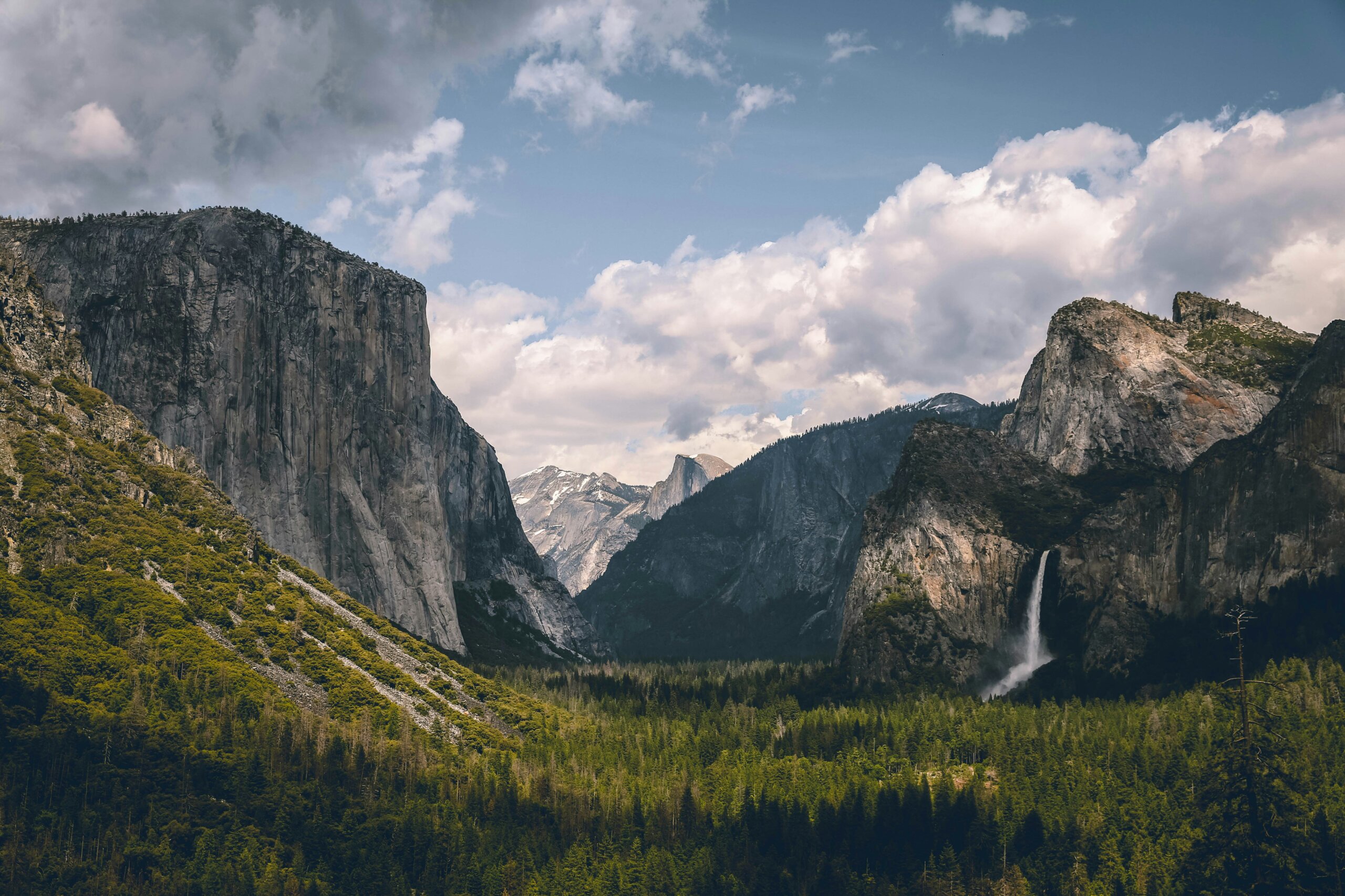 Green grass surround by mountains