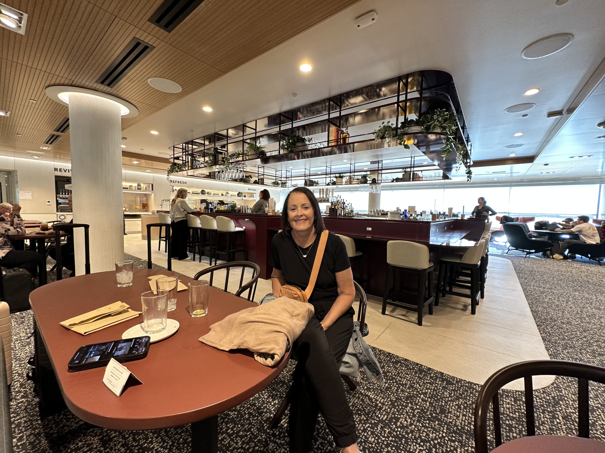 woman sitting in airport lounge