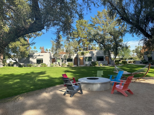 Colorful lawn chairs and fire pits.