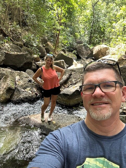 Man and woman on river