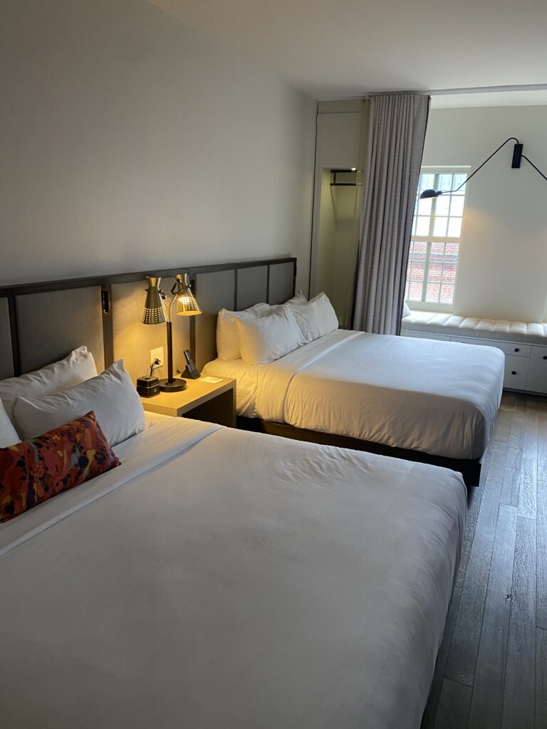 Hotel Room with white beds