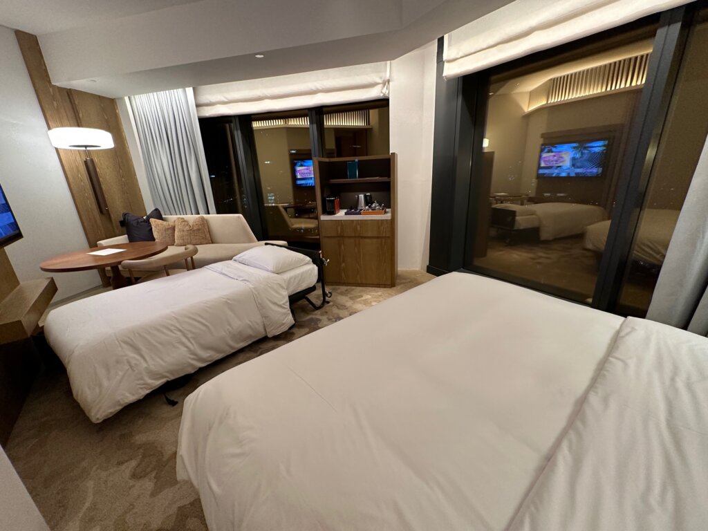 Hotel room with rollaway bed.