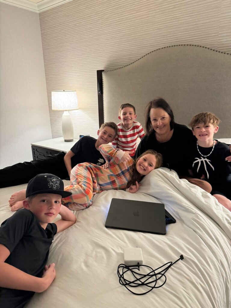 Children in bed with a grandma.