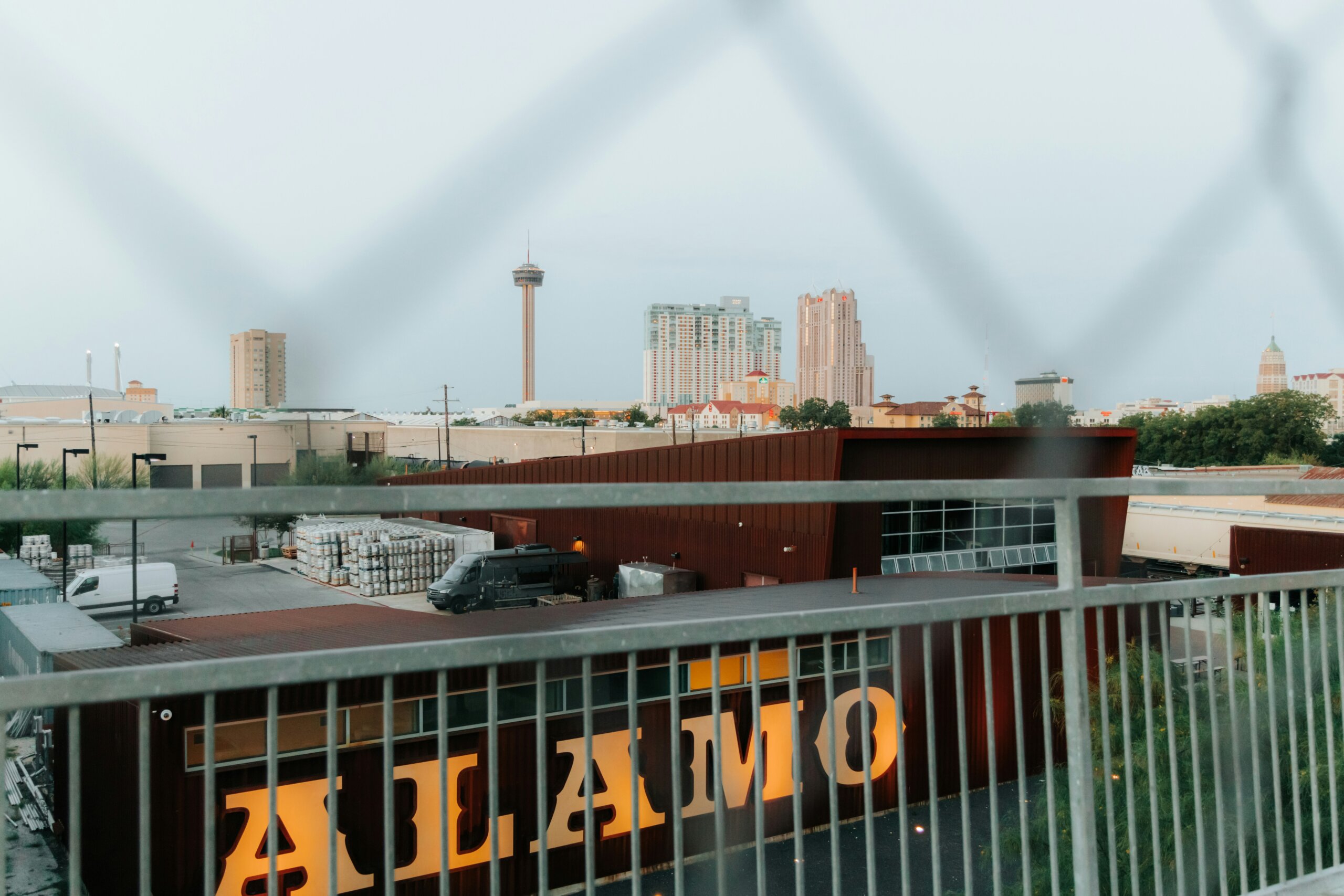 View of city with sign that says Alamo