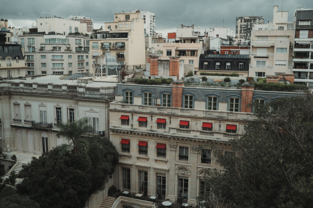 Parisian-eque buildings with dark sky in the background