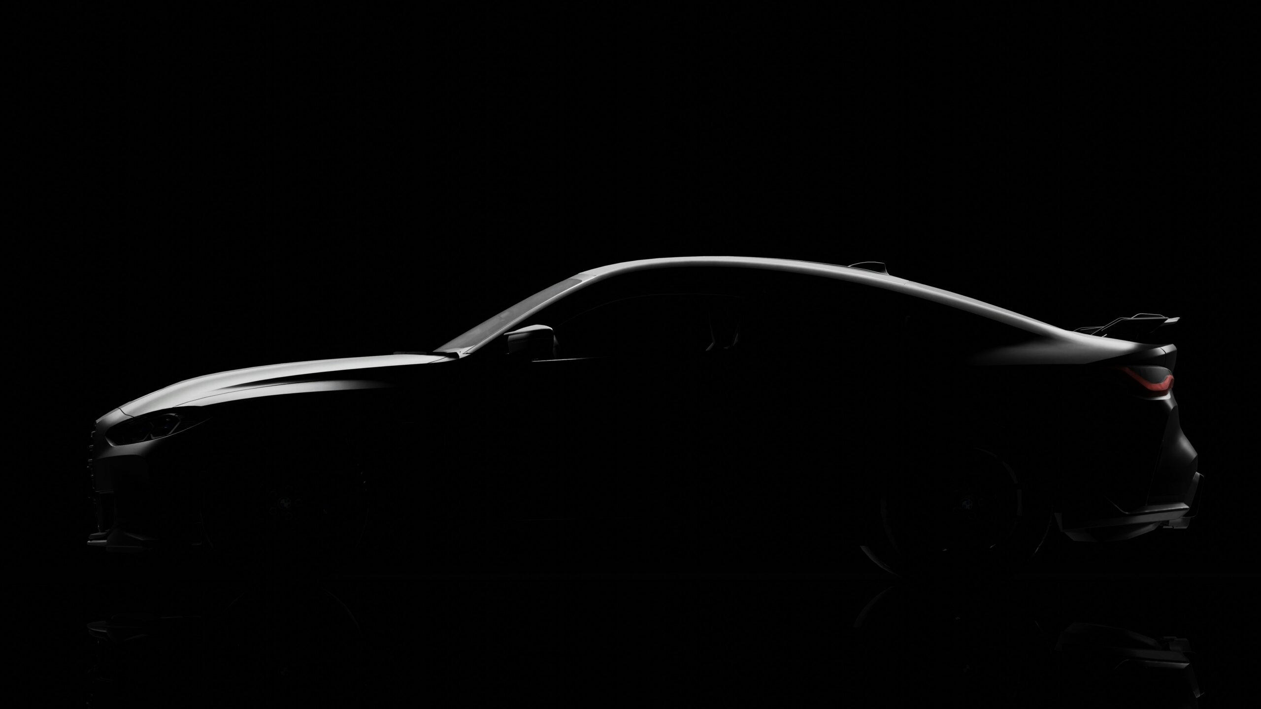 Dark black car on a dark black background